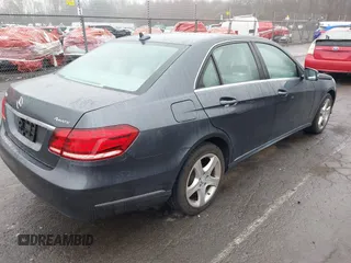 2016 Mercedes-Benz E-Class E 350 Luxury with VIN WDDHF8JB4GB252838, listed as a IAAI auction lot 41827623 with 53,706 mi miles. Bid and sale history available at carsss.com. Image 4.