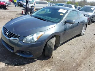 2013 Nissan Altima S with VIN 1N4AL2EP7DC141946, listed as a IAAI auction lot 41853798 with 63,763 mi miles and . Bid and sale history available at DreamBid. Image 3.