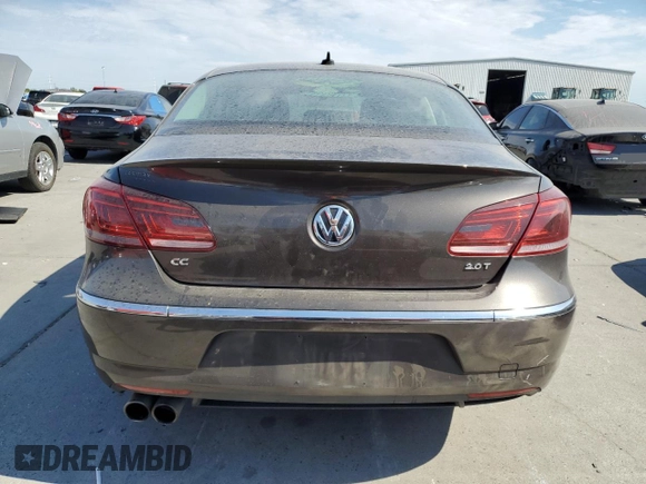 2014 Volkswagen CC R-Line with VIN WVWBP7AN7EE537157, listed as a Copart auction lot 65404654 with 153,336 mi miles and Salvage Title. Bid and sale history available at DreamBid. Image 6.