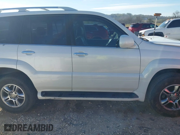 2009 Lexus GX 470 z VIN JTJBT20X390175930, wystawiony jako IAAI lot #41856945 z przebiegiem 207 809 mil mil oraz . Historia ofert i sprzedaży dostępna na DreamBid. Obrazek 13.
