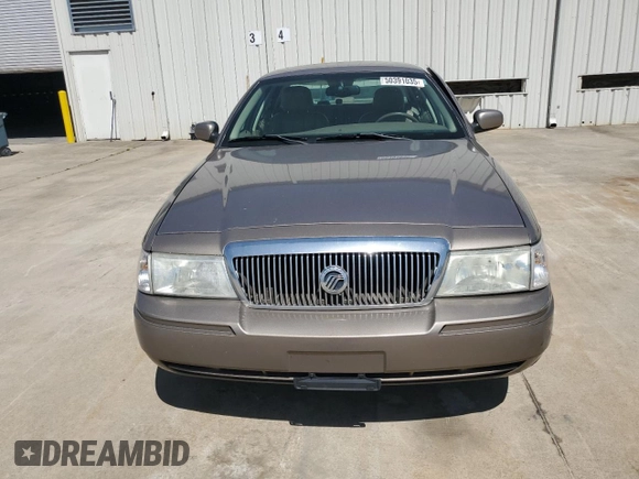 2005 Mercury Grand Marquis LS Premium z VIN 2MEFM75W95X642339, wystawiony jako Copart lot #50391035 z przebiegiem 127 526 mil mil oraz Szkoda całkowita • Salvage title. Historia ofert i sprzedaży dostępna na DreamBid. Obrazek 5.