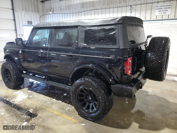 2023 Ford Bronco with VIN 1FMEE5BP5PLA99823, listed as a Copart auction lot 41954945 with 58,938 mi miles and Salvage Title. Bid and sale history available at carsss.com. Image 2.