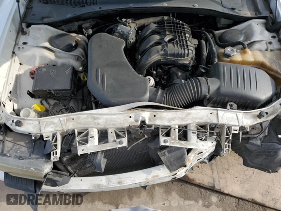 2013 Dodge Charger SE z VIN 2C3CDXBG2DH596898, wystawiony jako Copart lot #45524265 z przebiegiem 217 115 mil mil oraz Szkoda całkowita • Salvage title. Historia ofert i sprzedaży dostępna na DreamBid. Obrazek 11.
