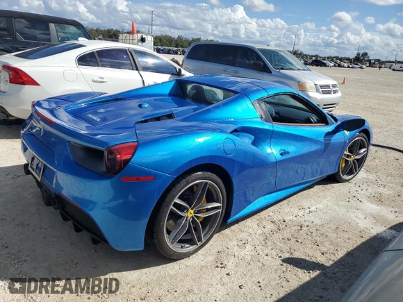 2018 Ferrari 488 z VIN ZFF80AMA9J0231686, wystawiony jako Copart lot #77623854 z przebiegiem Nie podano mil oraz Szkody całkowita. Historia ofert i sprzedaży dostępna na DreamBid. Obrazek 3.