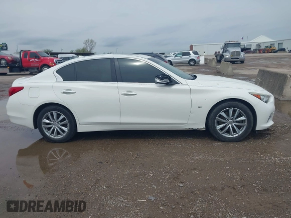 2015 Infiniti Q50 Premium z VIN JN1BV7AR6FM402481, wystawiony jako IAAI lot #41957004 z przebiegiem 171 913 mil mil oraz . Historia ofert i sprzedaży dostępna na DreamBid. Obrazek 13.