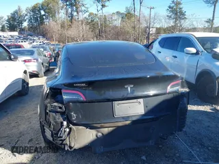 2022 Tesla Model 3 with VIN 5YJ3E1EA9NF147836, listed as a IAAI auction lot 41363603 with 28,748 mi miles. Bid and sale history available at carsss.com. Image 16.