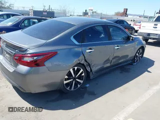 2018 Nissan Altima SR with VIN 1N4AL3AP6JC120402, listed as a IAAI auction lot 41949433 with 58,595 mi miles and . Bid and sale history available at carsss.com. Image 4.