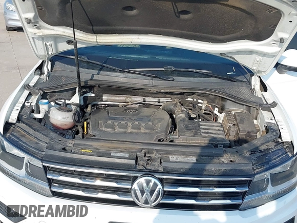 2018 Volkswagen Tiguan S with VIN 3VV1B7AX1JM119971, listed as a IAAI auction lot 42039977 with 108,932 mi miles and . Bid and sale history available at DreamBid. Image 10.