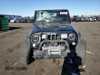 2009 Jeep Wrangler Rubicon with VIN 1J4GA64169L765933, listed as a Copart auction lot 84963104 with 107,190 mi miles and Salvage Title. Bid and sale history available at DreamBid. Image 5.