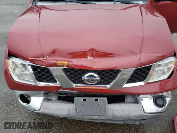 2008 Nissan Frontier SE z VIN 1N6AD07U78C447465, wystawiony jako Copart lot #55706105 z przebiegiem 170 914 mil mil oraz Szkoda całkowita • Salvage title. Historia ofert i sprzedaży dostępna na DreamBid. Obrazek 11.