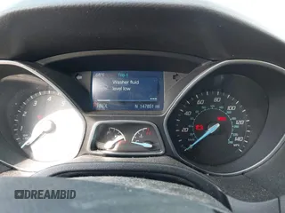 2014 Ford Focus SE with VIN 1FADP3F27EL396785, listed as a IAAI auction lot 42113377 with 147,851 mi miles. Bid and sale history available at carsss.com. Image 7.