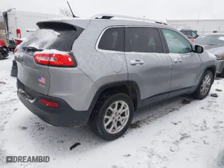 2015 Jeep Cherokee Latitude with VIN 1C4PJLCS4FW590087, listed as a IAAI auction lot 41313014 with NaN miles. Bid and sale history available at carsss.com. Image 4.