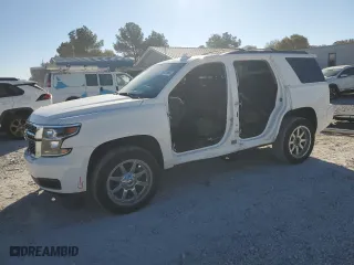 2017 Chevrolet Tahoe LS with VIN 1GNSKAEC7HR368394, listed as a Copart auction lot 76872904 with 124,665 mi miles and Salvage Title. Bid and sale history available at carsss.com. Image 1.