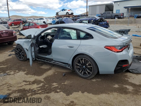2022 BMW 4 Series M440i xDrive with VIN WBA13AW0XNFM27700, listed as a Copart auction lot 48406425 with Not provided miles and Salvage title. Bid and sale history available at DreamBid. Image 2.