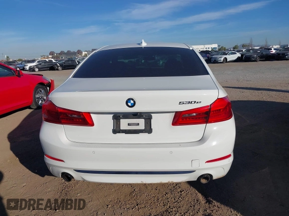 2019 BMW 5 Series 530e with VIN WBAJA9C59KB393045, listed as a IAAI auction lot 40994533 with 64,070 mi miles and . Bid and sale history available at DreamBid. Image 16.