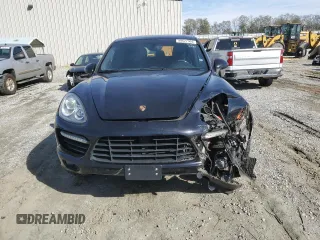 2012 Porsche Cayenne Turbo z VIN WP1AC2A2XCLA83901, wystawiony jako Copart lot #80627904 z przebiegiem 142 352 mil mil oraz Szkoda całkowita • Salvage title. Historia ofert i sprzedaży dostępna na DreamBid. Obrazek 5.