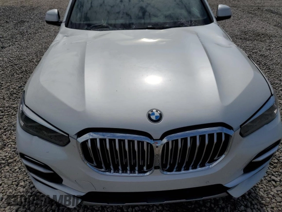 2019 BMW X5 xDrive40i with VIN 5UXCR6C5XKLK80703, listed as a Copart auction lot 63473495 with 57,260 mi miles and Salvage title. Bid and sale history available at DreamBid. Image 12.