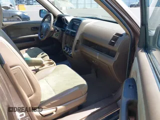 2002 Honda CR-V EX with VIN JHLRD78842C054131, listed as a IAAI auction lot 42101159 with 266,533 mi miles and . Bid and sale history available at DreamBid. Image 5.