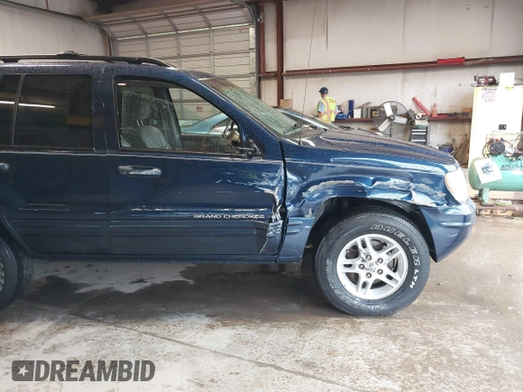 2000 Jeep Grand Cherokee Limited with VIN 1J4GW58N1YC264567, listed as a IAAI auction lot 42215459 with 170,874 mi miles and . Bid and sale history available at DreamBid. Image 6.
