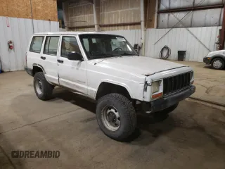 1998 Jeep Cherokee Sport with VIN 1J4FJ68S2WL239891, listed as a Copart auction lot 62966025 with 128,226 mi miles and Clean title. Bid and sale history available at DreamBid. Image 4.