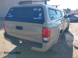 2017 Toyota Tacoma SR5 with VIN 3TMBZ5DN8HM009538, listed as a IAAI auction lot 41288551 with 84,551 mi miles and . Bid and sale history available at DreamBid. Image 4.