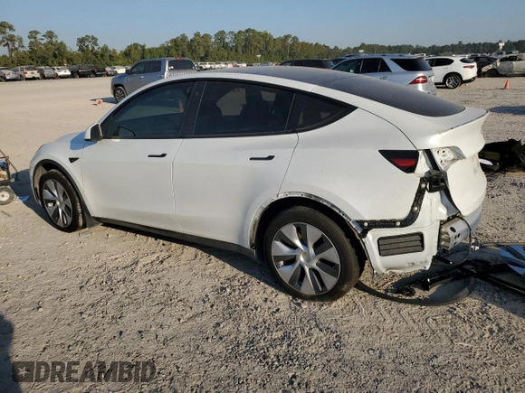 2023 Tesla Model Y Long Range z VIN 7SAYGDEE8PA069248, wystawiony jako Copart lot #74120944 z przebiegiem 17 085 mil mil oraz Szkoda całkowita • Salvage title. Historia ofert i sprzedaży dostępna na DreamBid. Obrazek 2.