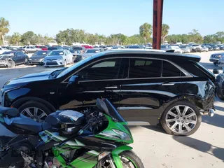2020 Cadillac XT4 FWD Premium Luxury with VIN 1GYFZCR42LF144359, listed as a IAAI auction lot 42012677 with 34,490 mi miles and . Bid and sale history available at carsss.com. Image 15.