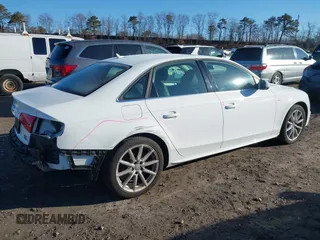 2016 Audi A4 Premium Plus with VIN WAUFFAFL6GN006105, listed as a IAAI auction lot 41698495 with 155,424 mi miles. Bid and sale history available at carsss.com. Image 4.