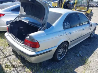 2000 BMW M5 z VIN WBSDE9349YBZ96946, wystawiony jako IAAI lot #42043141 z przebiegiem 107 000 mil mil oraz . Historia ofert i sprzedaży dostępna na DreamBid. Obrazek 4.