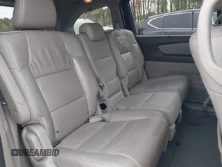 2012 Honda Odyssey Touring with VIN 5FNRL5H98CB026754, listed as a IAAI auction lot 41935562 with 165,626 mi miles. Bid and sale history available at carsss.com. Image 8.