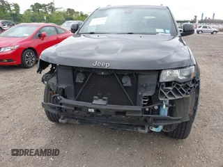 2016 Jeep Grand Cherokee Laredo z VIN 1C4RJFAG6GC475857, wystawiony jako IAAI lot #42311448 z przebiegiem 106 472 mil mil oraz . Historia ofert i sprzedaży dostępna na DreamBid. Obrazek 12.
