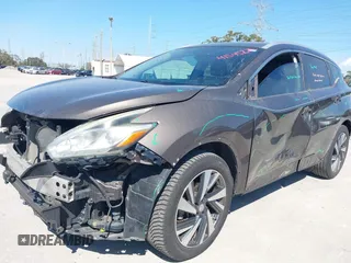 2015 Nissan Murano Platinum z VIN 5N1AZ2MG7FN230347, wystawiony jako IAAI lot #41545220 z przebiegiem 134 435 mil mil oraz . Historia ofert i sprzedaży dostępna na DreamBid. Obrazek 6.