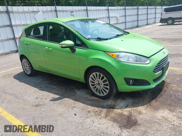 2014 Ford Fiesta Titanium z VIN 3FADP4FJ7EM203322, wystawiony jako IAAI lot #42448840 z przebiegiem 91 901 mil mil oraz . Historia ofert i sprzedaży dostępna na DreamBid. Obrazek 1.