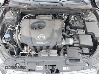 2018 Mazda 3 Touring z VIN 3MZBN1V31JM268280, wystawiony jako IAAI lot #42276418 z przebiegiem 58 366 mil mil oraz . Historia ofert i sprzedaży dostępna na DreamBid. Obrazek 10.
