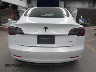 2023 Tesla Model 3 Long Range with VIN 5YJ3E1EB3PF603955, listed as a IAAI auction lot 41915541 with 33,691 mi miles and . Bid and sale history available at DreamBid. Image 16.