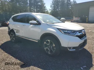 2018 Honda CR-V Touring with VIN 2HKRW2H9XJH619830, listed as a Copart auction lot 53694675 with 95,703 mi miles and Salvage title. Bid and sale history available at DreamBid. Image 4.