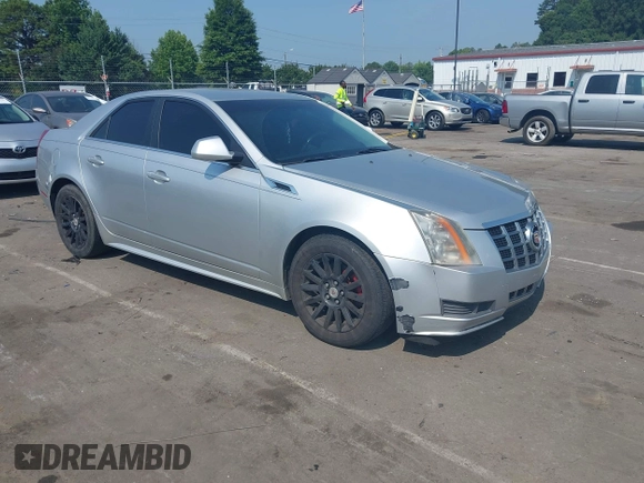 2012 Cadillac CTS with VIN 1G6DC5E51C0156873, listed as a IAAI auction lot 42587421 with 169,006 mi miles and . Bid and sale history available at DreamBid. Image 1.