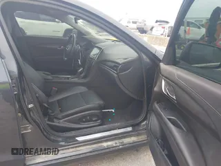 2014 Cadillac ATS Standard RWD with VIN 1G6AA5RX4E0104676, listed as a IAAI auction lot 41934130 with 168,178 mi miles and . Bid and sale history available at carsss.com. Image 5.
