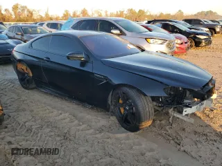 2017 BMW M6 z VIN WBS6J9C3XHD934858, wystawiony jako Copart lot #73714104 z przebiegiem Nie podano mil oraz Szkoda całkowita • Salvage title. Historia ofert i sprzedaży dostępna na DreamBid. Obrazek 4.