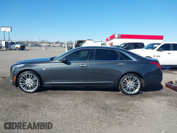 2016 Cadillac CT6 Premium Luxury AWD with VIN 1G6KF5RS6GU159166, listed as a IAAI auction lot 41764385 with 118,428 mi miles and . Bid and sale history available at DreamBid. Image 14.