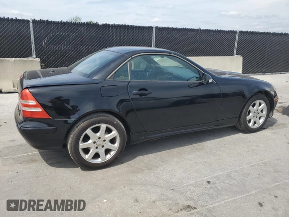 2003 Mercedes-Benz SLK 230 Kompressor with VIN WDBKK49F13F277323, listed as a Copart auction lot 53980515 with 174,276 mi miles and Salvage Title. Bid and sale history available at DreamBid. Image 3.
