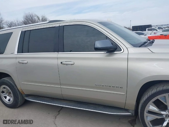 2015 Chevrolet Suburban LTZ with VIN 1GNSKKKC0FR525772, listed as a IAAI auction lot 41745084 with 187,981 mi miles. Bid and sale history available at carsss.com. Image 13.