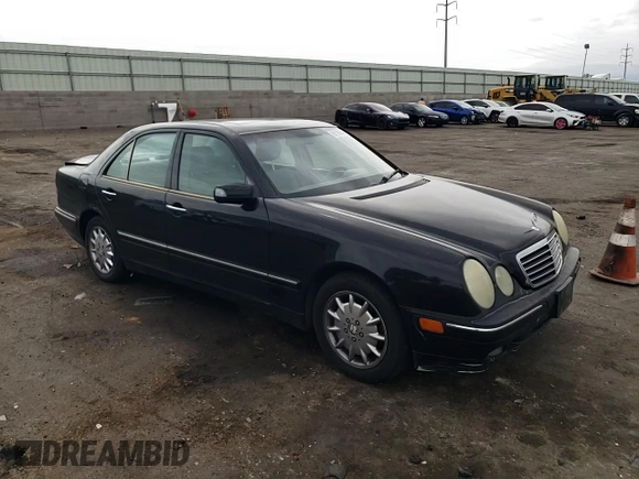 2000 Mercedes-Benz E-Class with VIN WDBJF65J5YB068297, listed as a Copart auction lot 69199004 with 236,751 mi miles and Salvage Title. Bid and sale history available at carsss.com. Image 11.