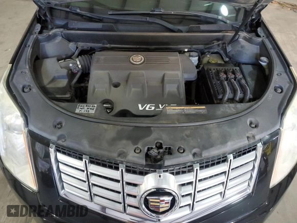 2016 Cadillac SRX Premium Collection с VIN 3GYFNDE35GS505972, выставлен на аукционе Copart как лот 79342004 с пробегом 166 238 миль миль и Чистый • Clean title. История ставок и продаж доступна на DreamBid. Изображение 12.