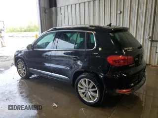 2013 Volkswagen Tiguan S with VIN WVGAV3AX1DW602083, listed as a Copart auction lot 57977515 with 114,375 mi miles and Clean title. Bid and sale history available at DreamBid. Image 2.