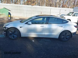 2018 Tesla Model 3 Long Range Battery with VIN 5YJ3E1EA0JF153146, listed as a IAAI auction lot 41621919 with 76,794 mi miles and . Bid and sale history available at DreamBid. Image 14.