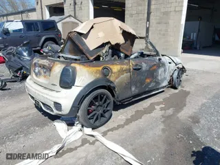 2017 MINI Convertible John Cooper Works with VIN WMWWH9C31H3A78648, listed as a IAAI auction lot 41804606 with 47,961 mi miles. Bid and sale history available at carsss.com. Image 4.