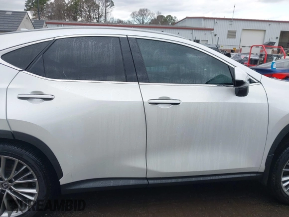 2023 Lexus NX 350h Premium with VIN JTJGKCEZ6P2011257, listed as a IAAI auction lot 41706179 with 4,917 mi miles and . Bid and sale history available at DreamBid. Image 13.