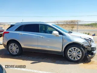 2017 Cadillac XT5 Premium Luxury FWD with VIN 1GYKNCRS2HZ259168, listed as a IAAI auction lot 42054328 with 104,599 mi miles and . Bid and sale history available at DreamBid. Image 13.
