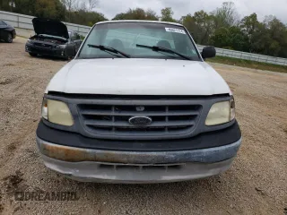 2001 Ford F-150 XL with VIN 3FTZF17201MA44310, listed as a Copart auction lot 73794104 with Not provided miles and Salvage title. Bid and sale history available at DreamBid. Image 5.